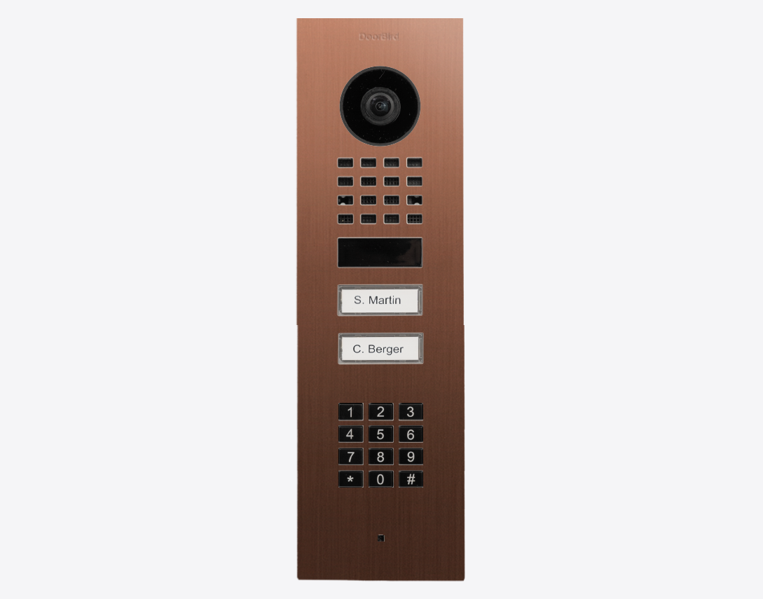 DoorBird bronze flush-mount video door station with camera, keypad, and two call labels