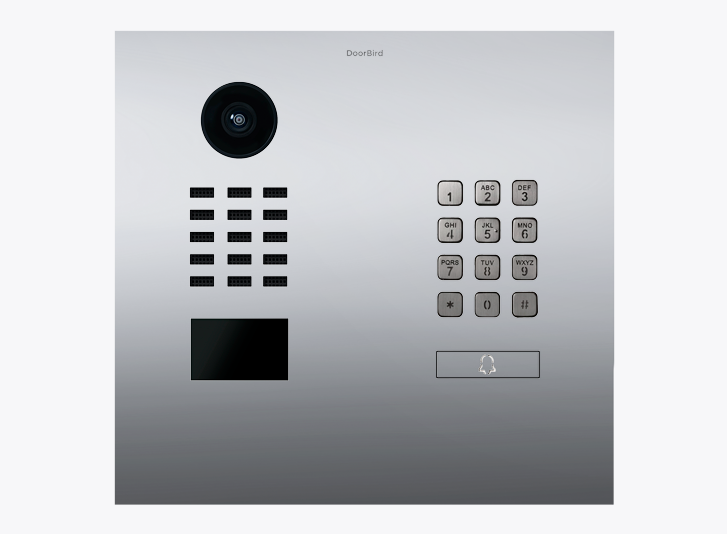 IP video door station with round camera lens and numeric keypad