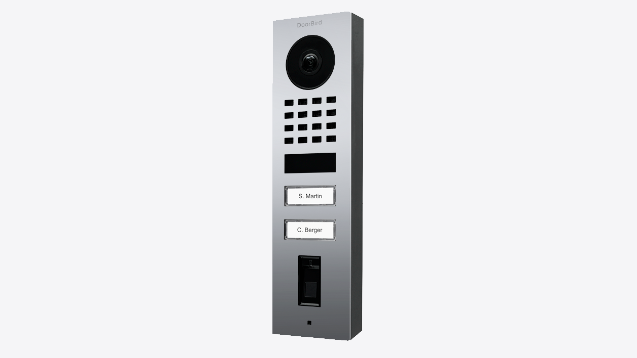 Chrome surface-mount IP video door station with camera, speaker grille, and name labels
