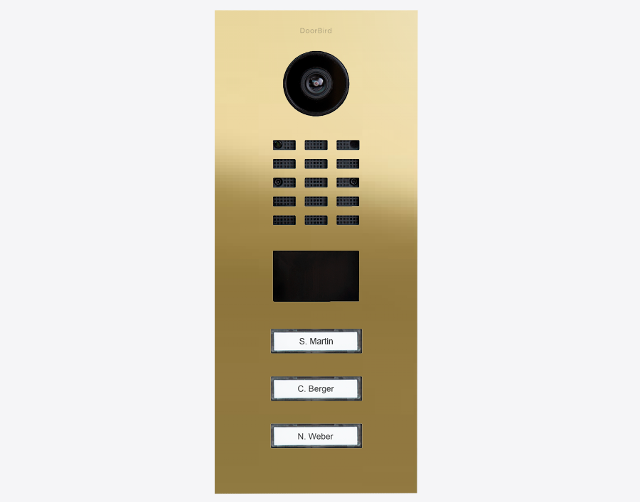 Brass 3-button video door station with camera and keypad, front panel.
