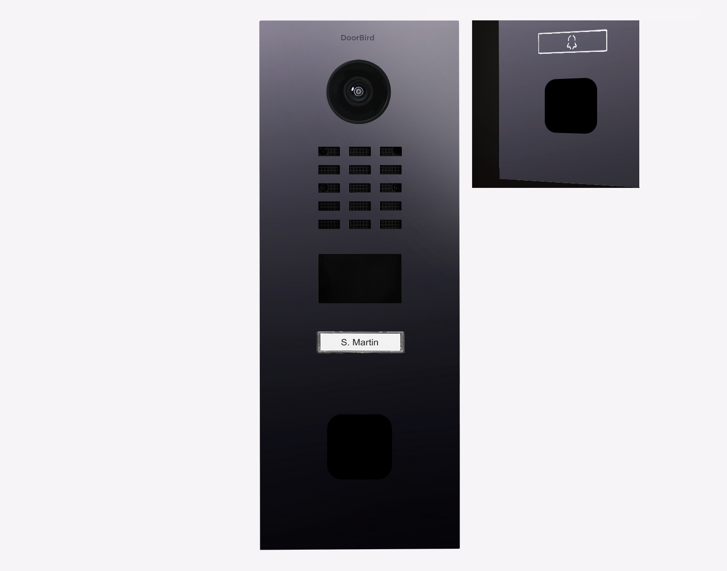DoorBird IP video door station with camera lens, keypad grid, and name label on dark panel