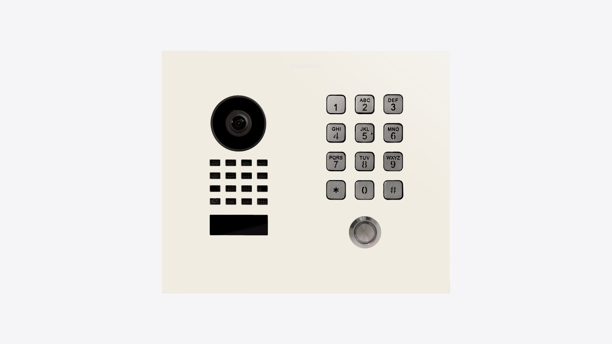 Light-colored IP video door station panel with camera lens and keypad buttons