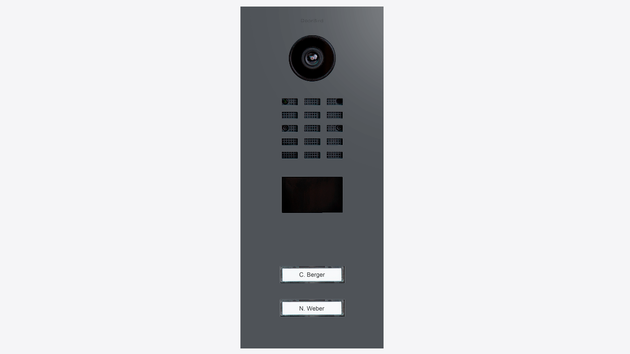 Slate grey video door station faceplate with camera, call keypad grid, and display