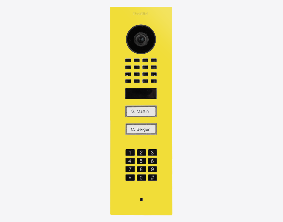 DoorBird flush mount video door station in sulfur yellow with camera and keypad