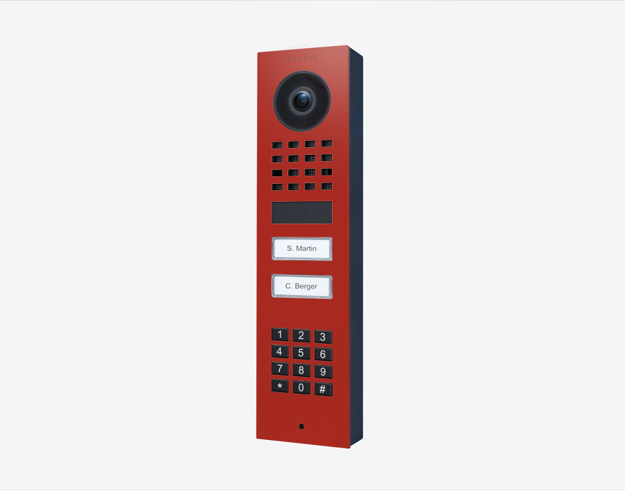 Flame red video door station with camera lens, keypad, and two name call buttons