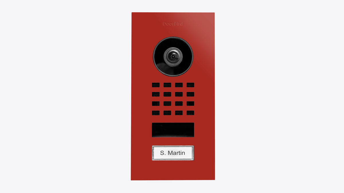 DoorBird flush-mount IP video intercom call button in flame red with camera and keypad