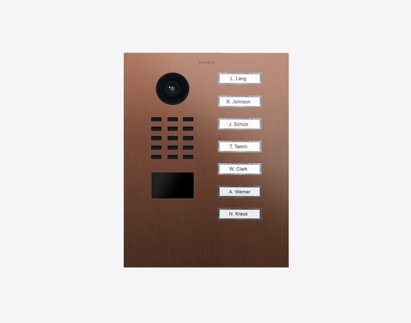 Bronze IP video door station with camera lens and 7 call buttons with name labels