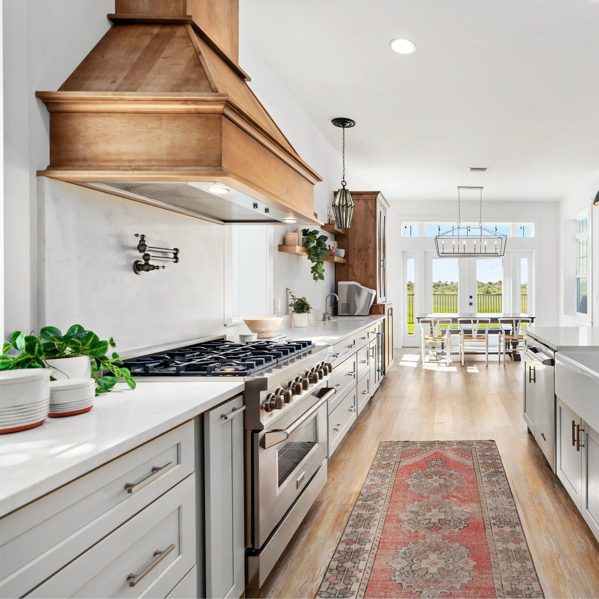 ZLINE 36-inch Legacy Series Dual Fuel Range with 6 Gas Brass Burners and Electric Oven in Stainless Steel in a kitchen