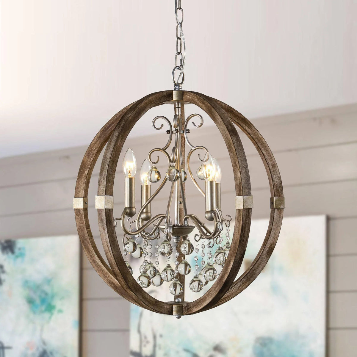 Brown circular 4-light pendant with curved metal arms, clear shades, and crystal drops