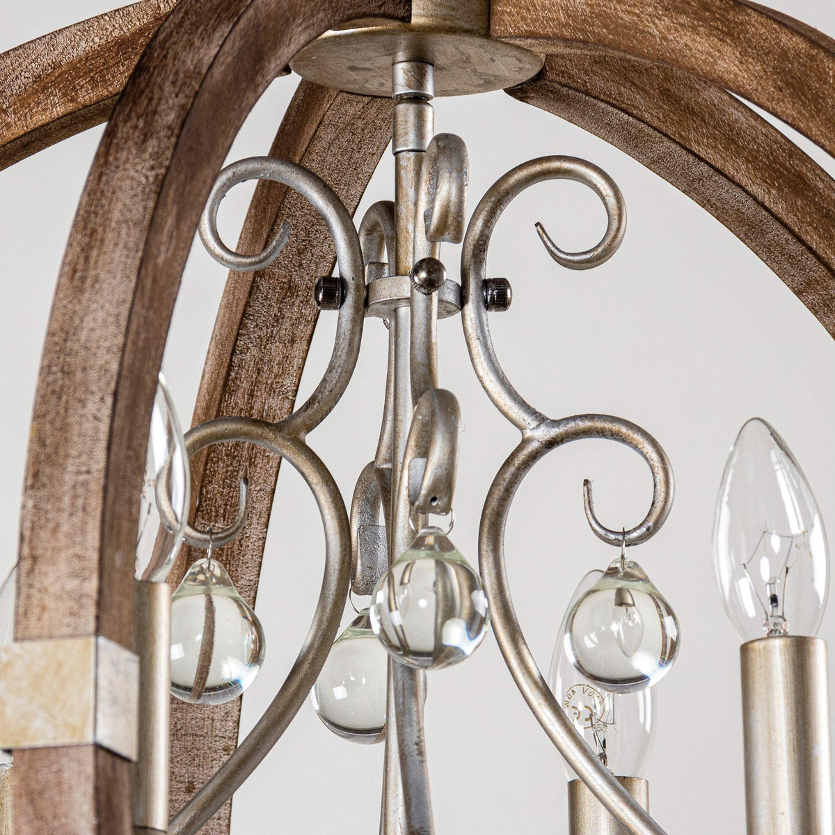 Brown 4-light caged island pendant with curved metal frame and clear glass shades