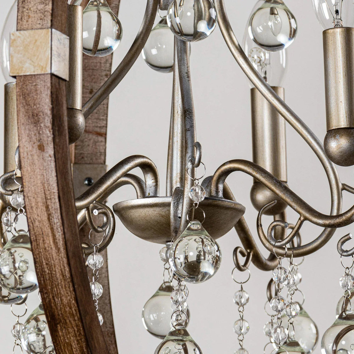 4-light caged pendant with hanging clear glass droplets and round metal center bowl