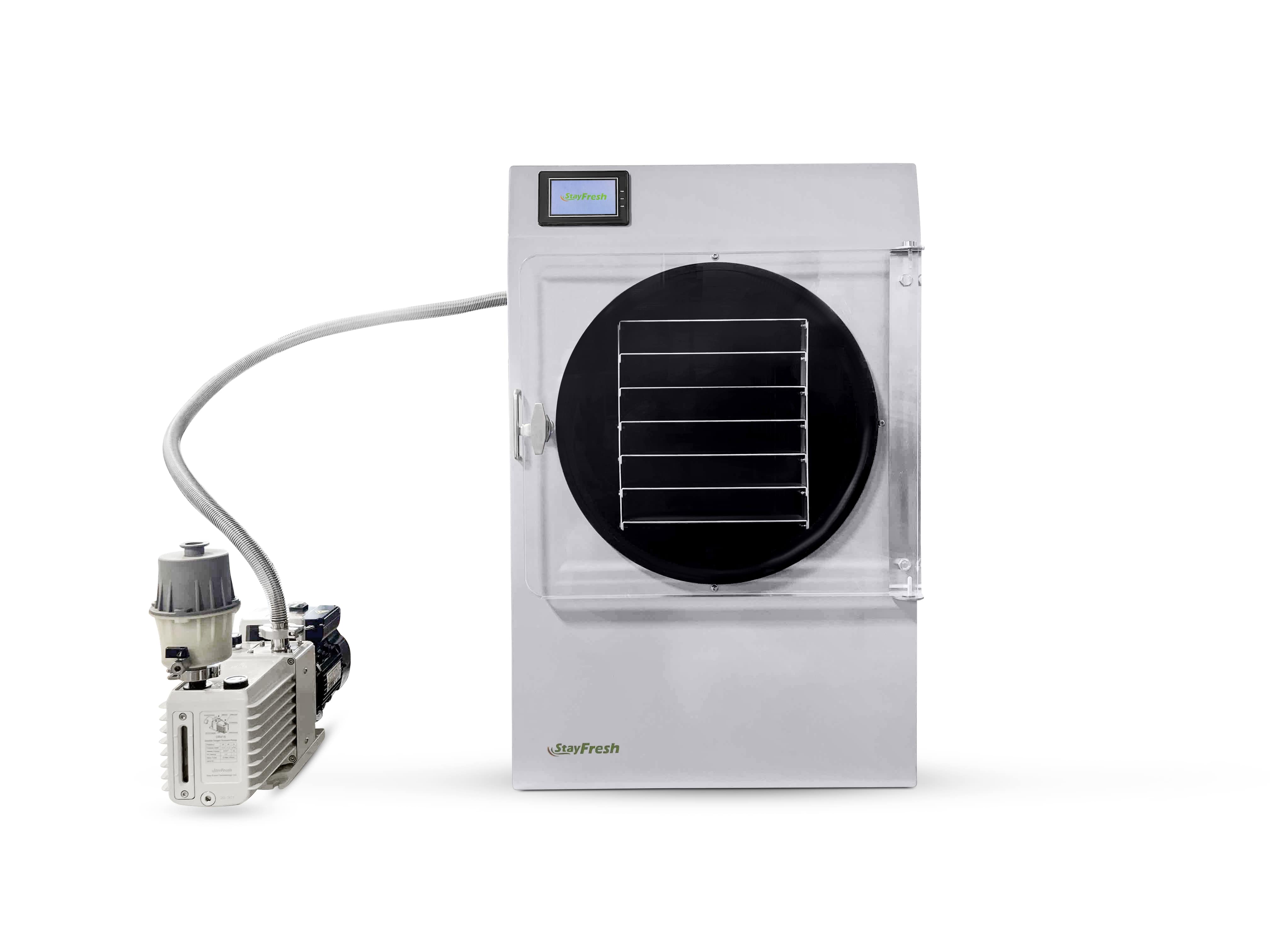 White freeze dryer unit with round chamber door and separate vacuum pump