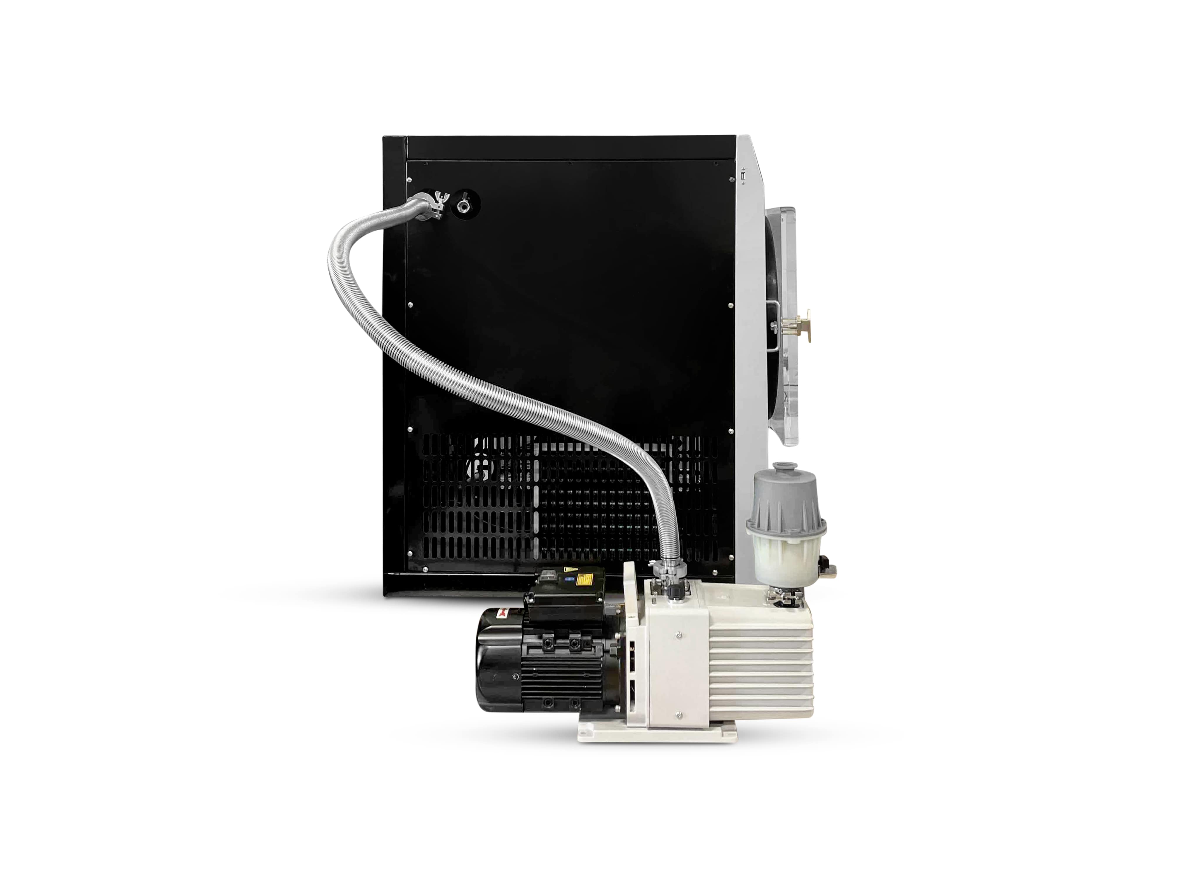 Freeze dryer with open rear chamber and attached commercial pump with tubing