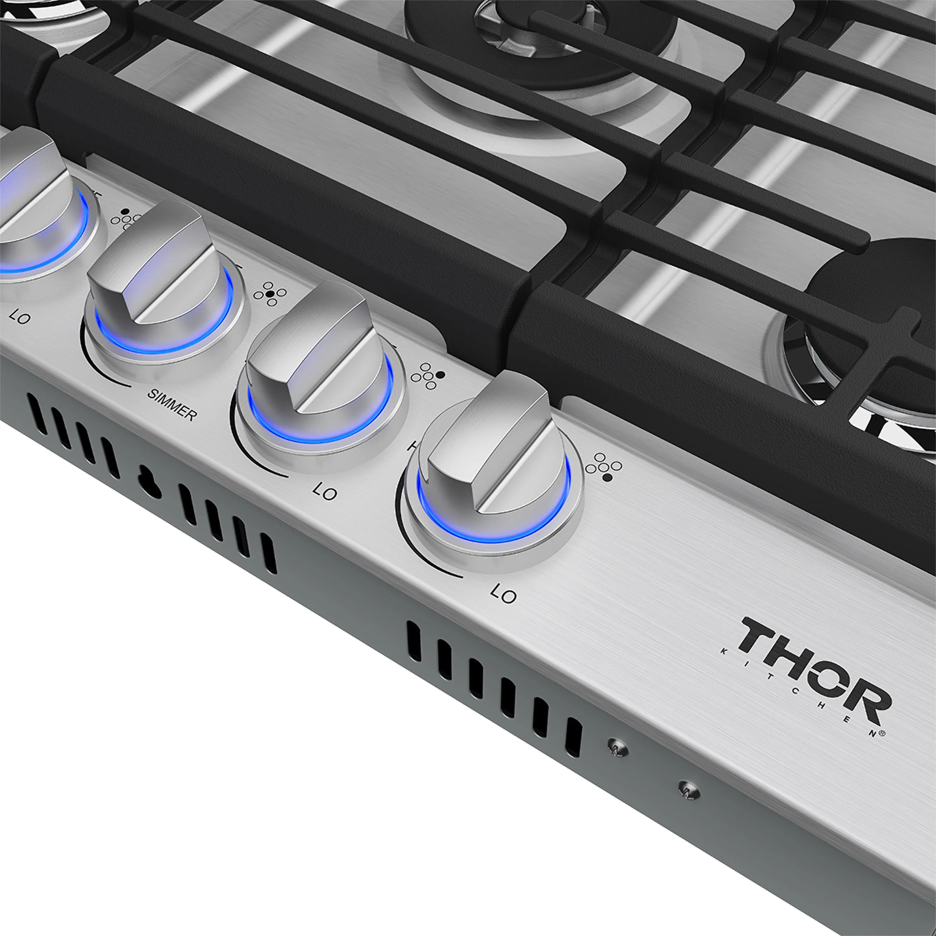 Stainless steel cooktop control panel with five silver knobs and black vent slots