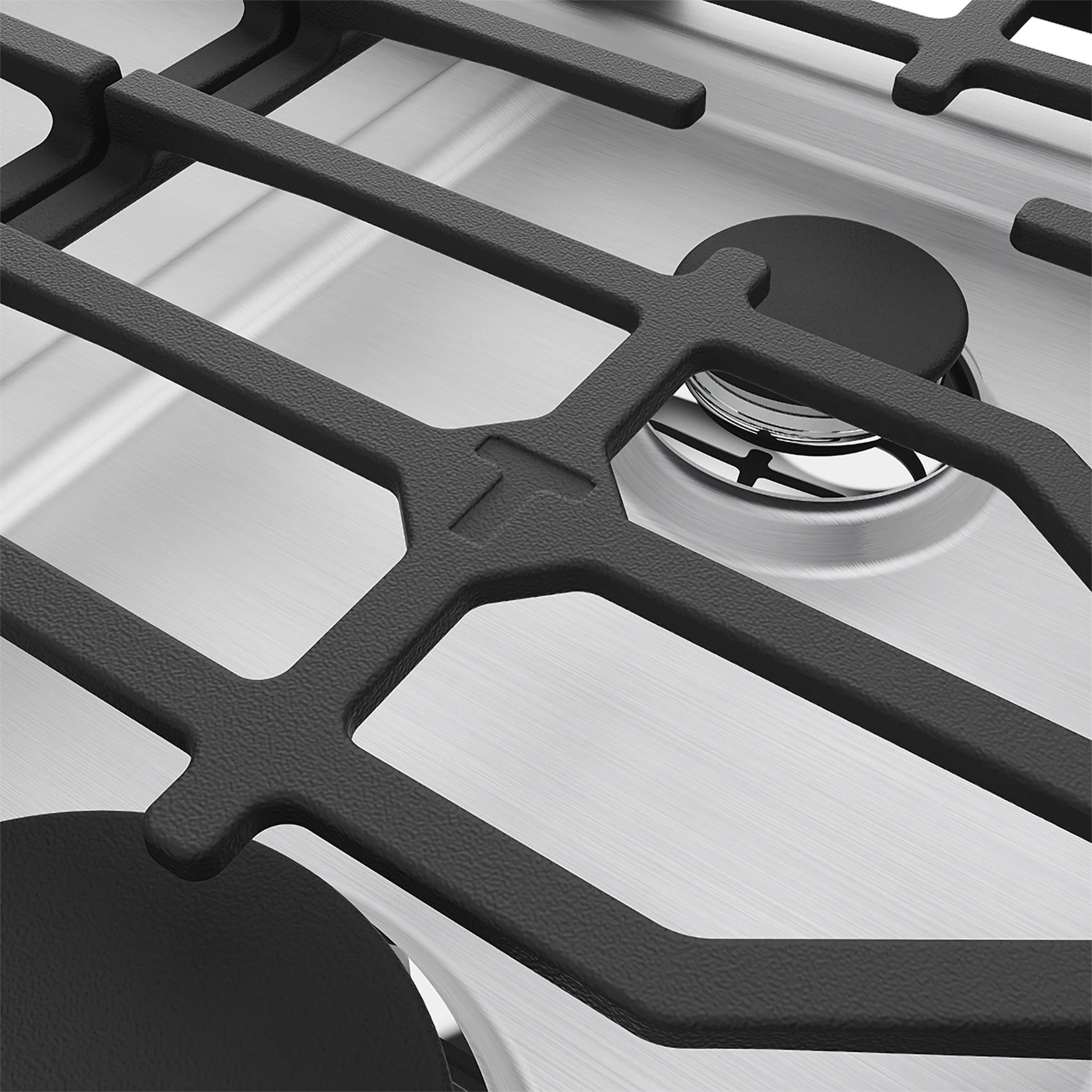 Gas cooktop burner with black cast-iron grate and silver burner head