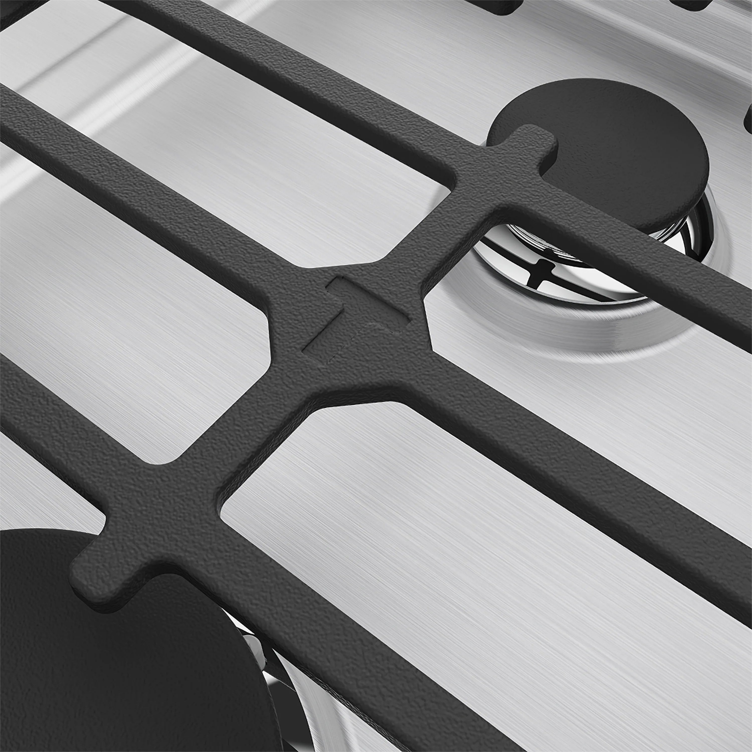 Black cast-iron style cooktop grate and gas burner head with metal burner ring.