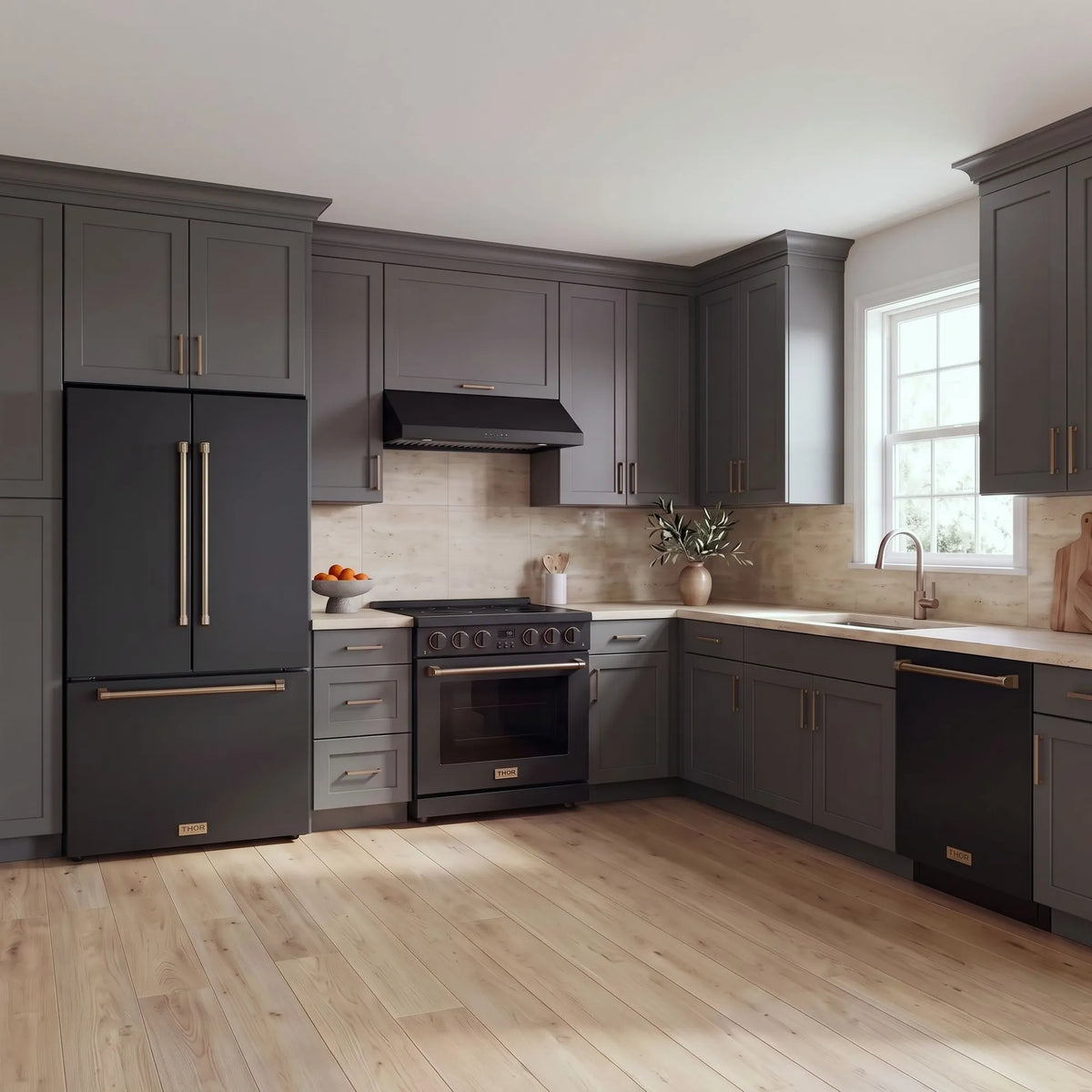Thor Kitchen A-Series black and bronze kitchen with a 36-inch electric range, under-cabinet hood, French door refrigerator, dishwasher