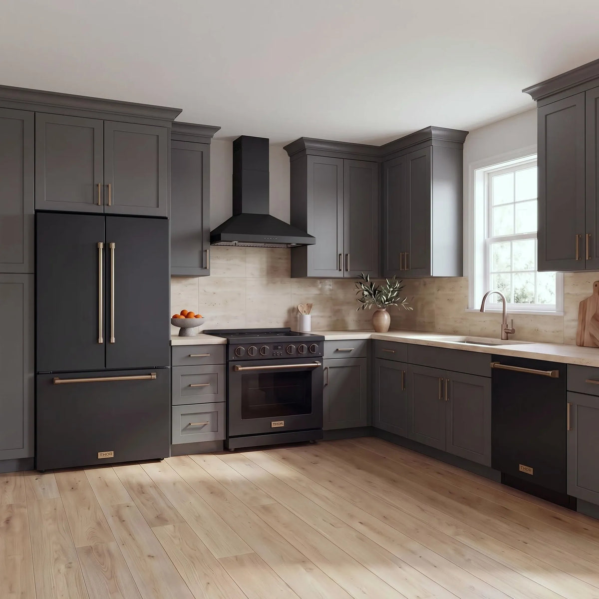 Thor Kitchen A-Series black and bronze kitchen with a 36-inch electric range, wall-mount chimney hood, French door refrigerator, dishwasher