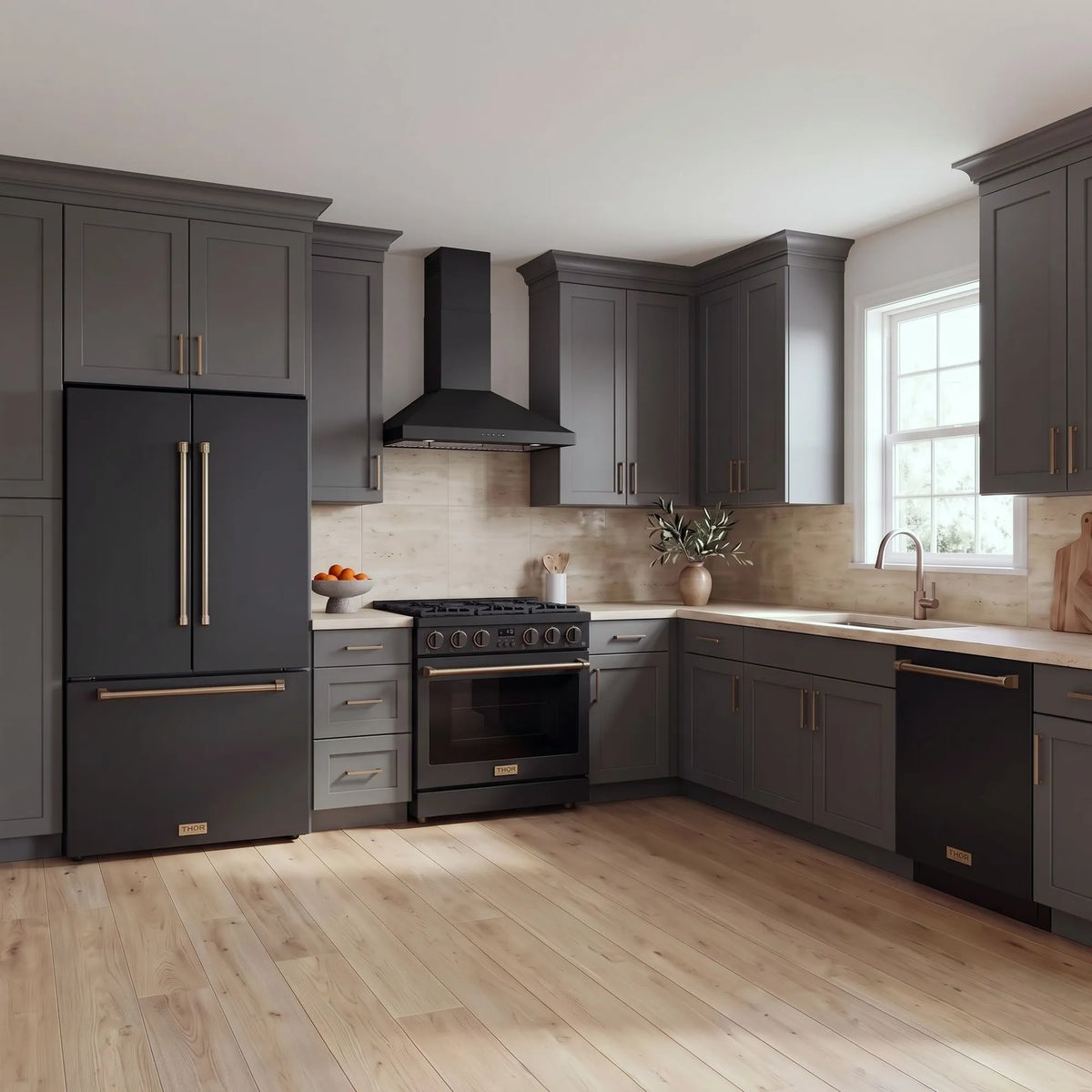 Thor Kitchen A-Series black and bronze kitchen with a 36-inch gas range, wall-mount chimney hood, French door refrigerator, dishwasher