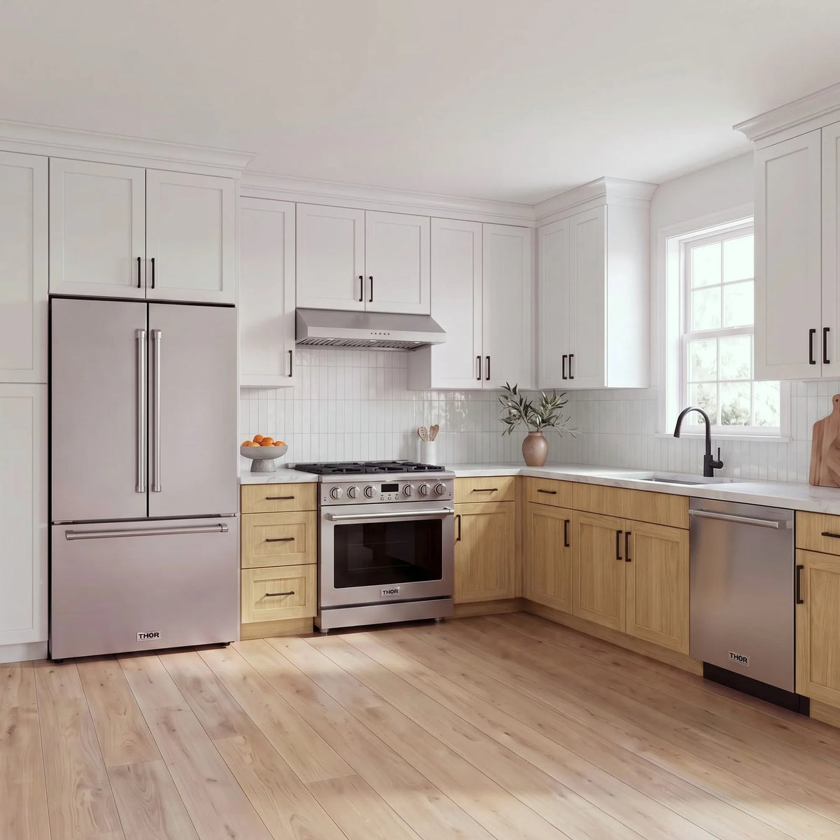 Thor Kitchen A-Series stainless steel kitchen with a 36-inch gas range, under-cabinet hood, French door refrigerator, dishwasher