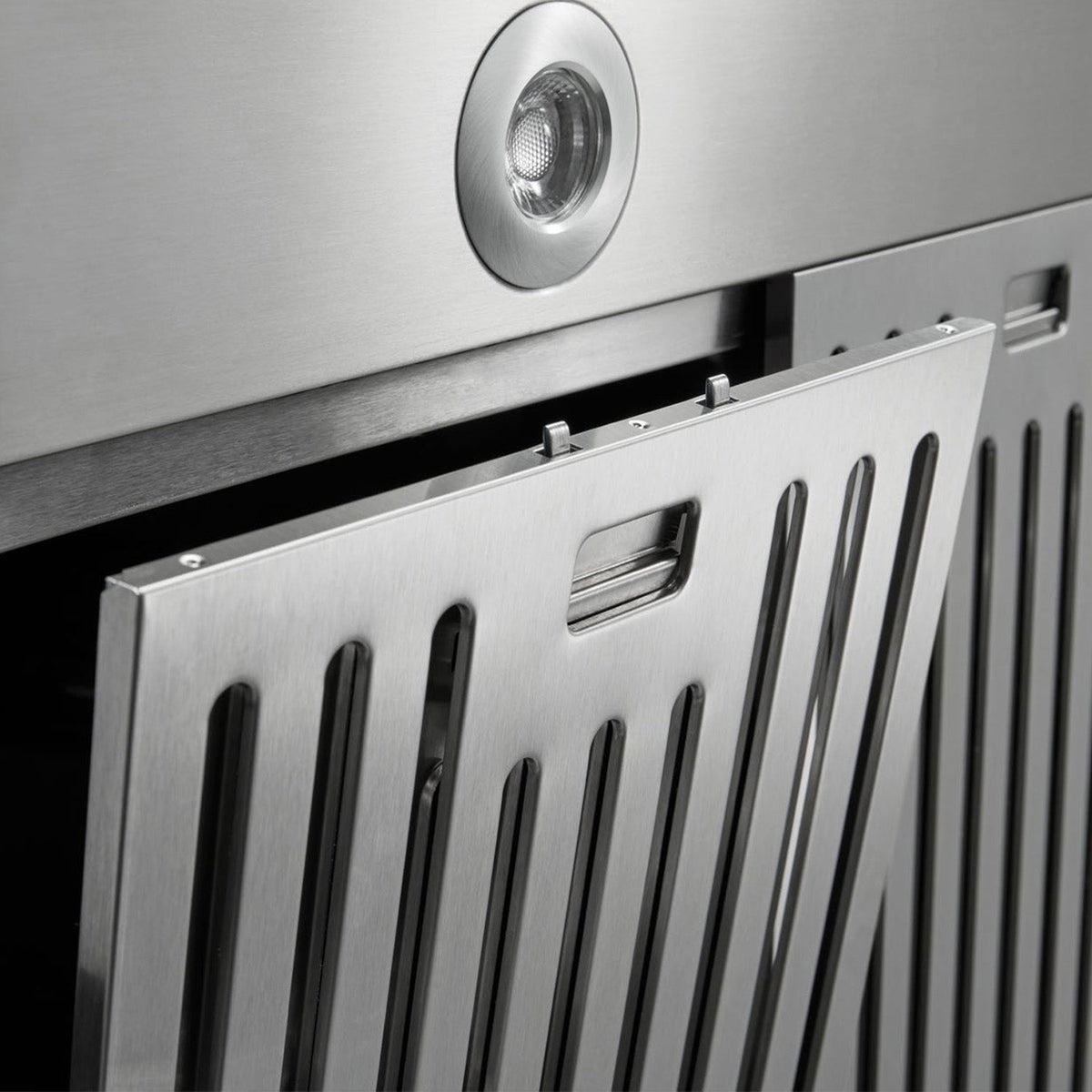 Stainless steel dishwasher open door with panel lights and vented grille