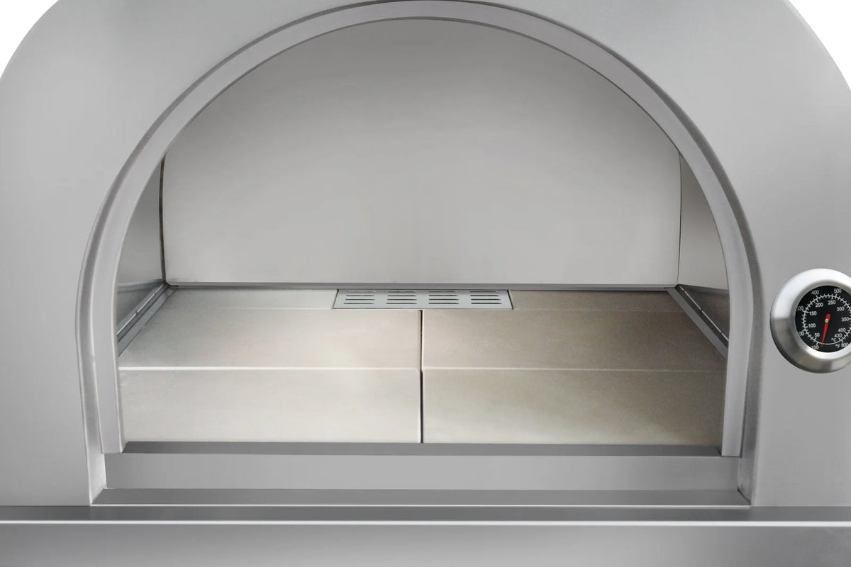 Stainless steel grill firebox interior with warming grate and vented bottom tray