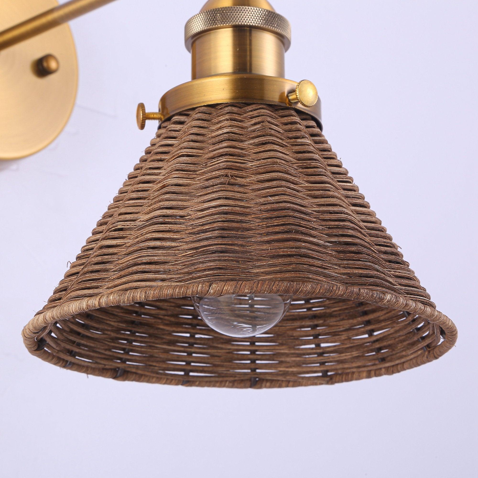 Golden traditional 1-light wall lamp with woven rattan cone shade and clear glass lens