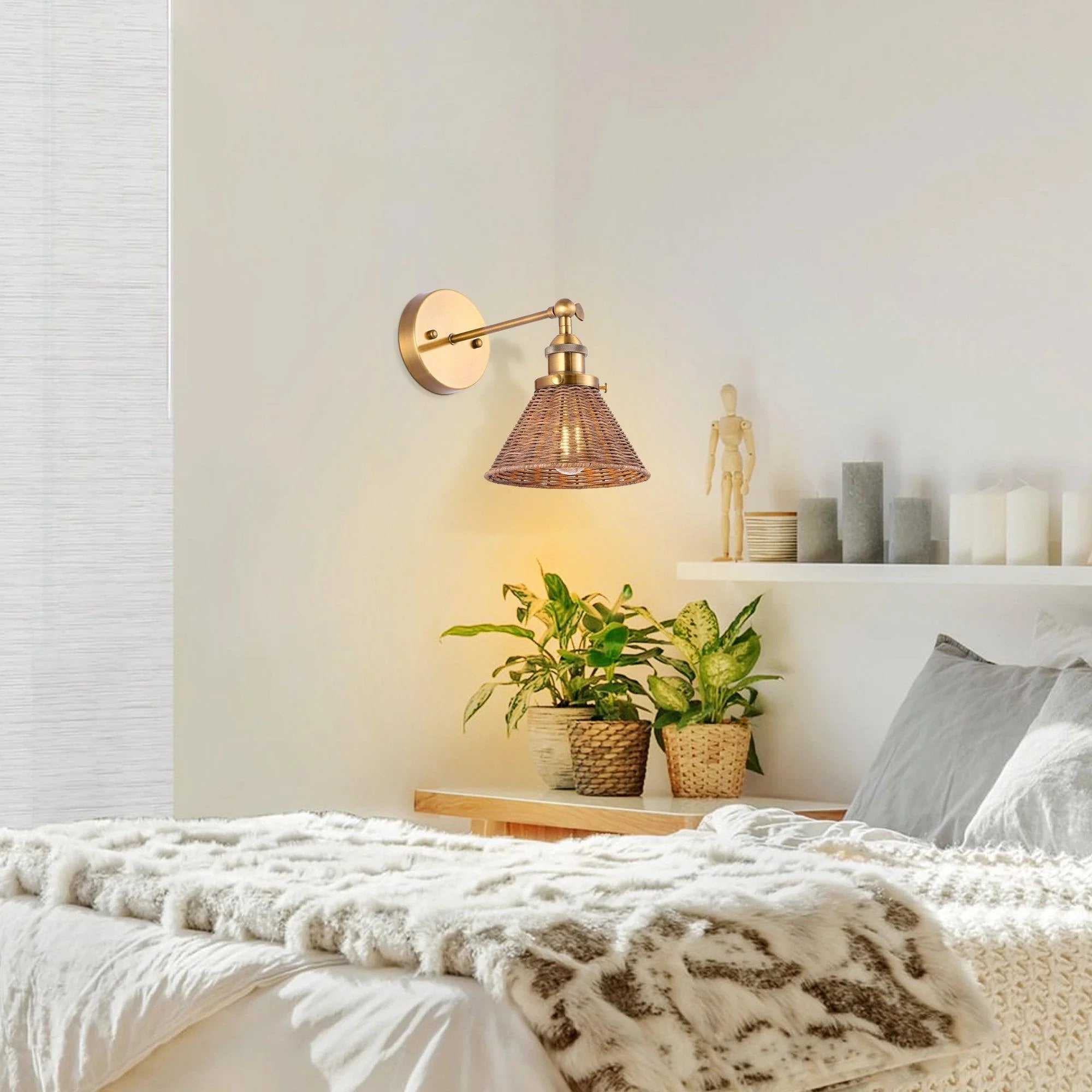 Golden wall sconce with woven rattan shade and adjustable-style metal top, 1-light