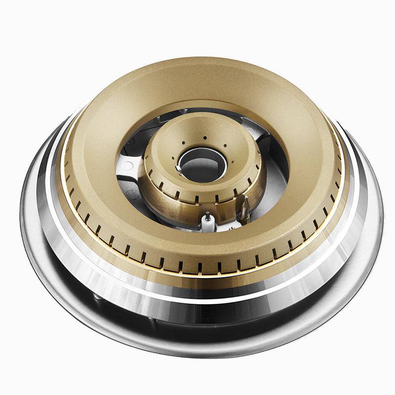 Tri-ring burner assembly in close-up with brass cap and silver stainless base