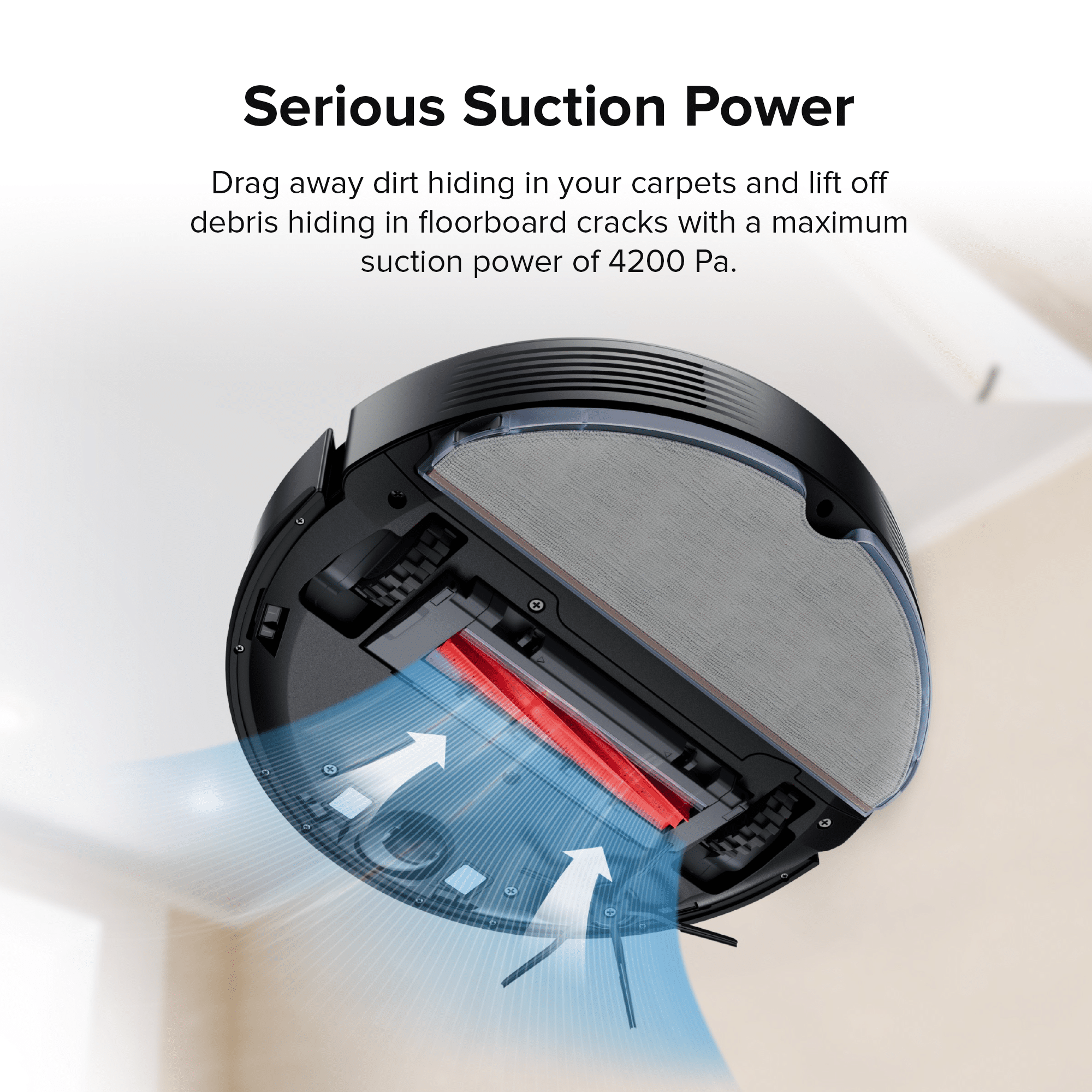 Black Roborock robot vacuum and mop top view showing cleaning brush and airflow