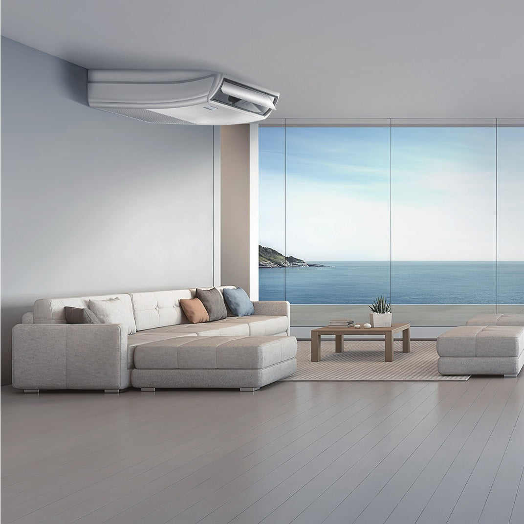 Wall-mounted split air conditioner indoor unit installed above a living room seating area