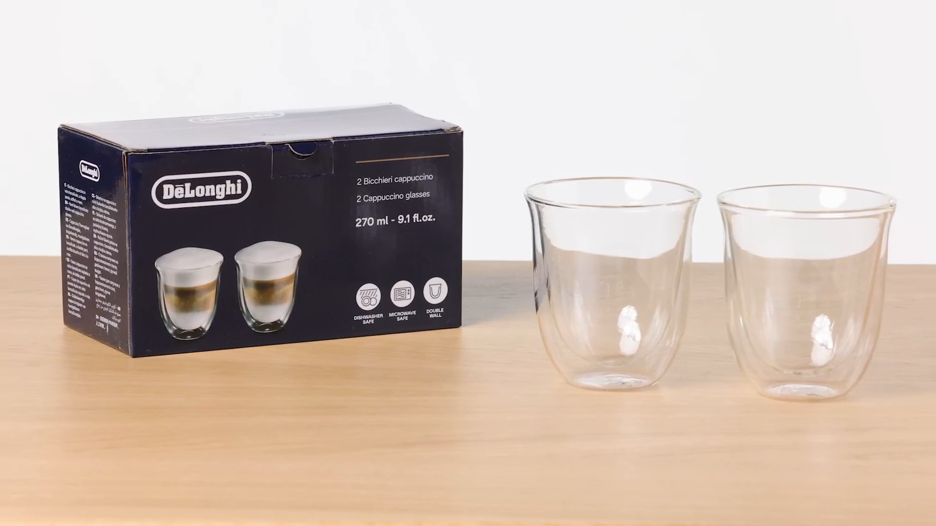 Set of clear cappuccino glasses on a table