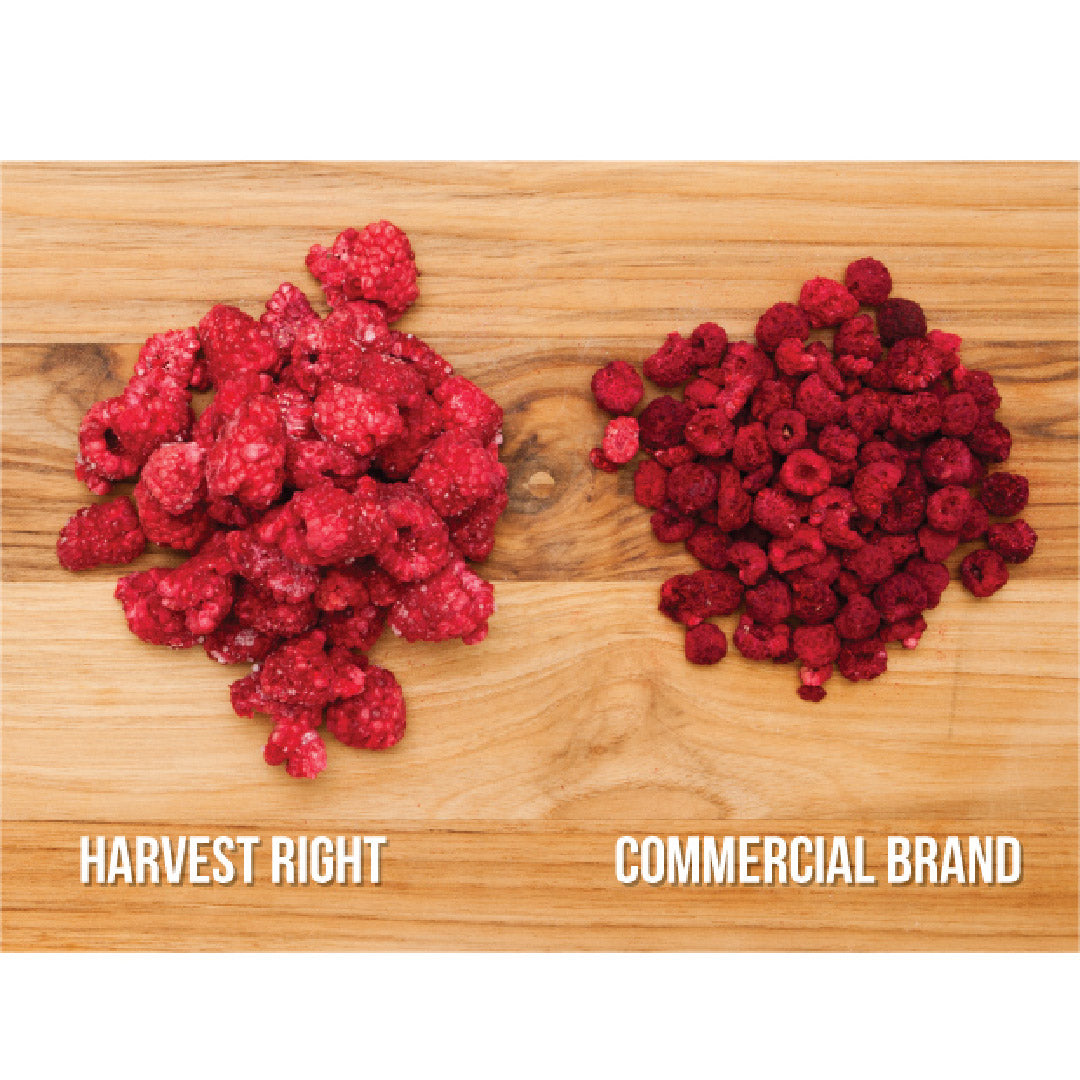 Freeze dryer food sample: piles of red berries on a wooden board