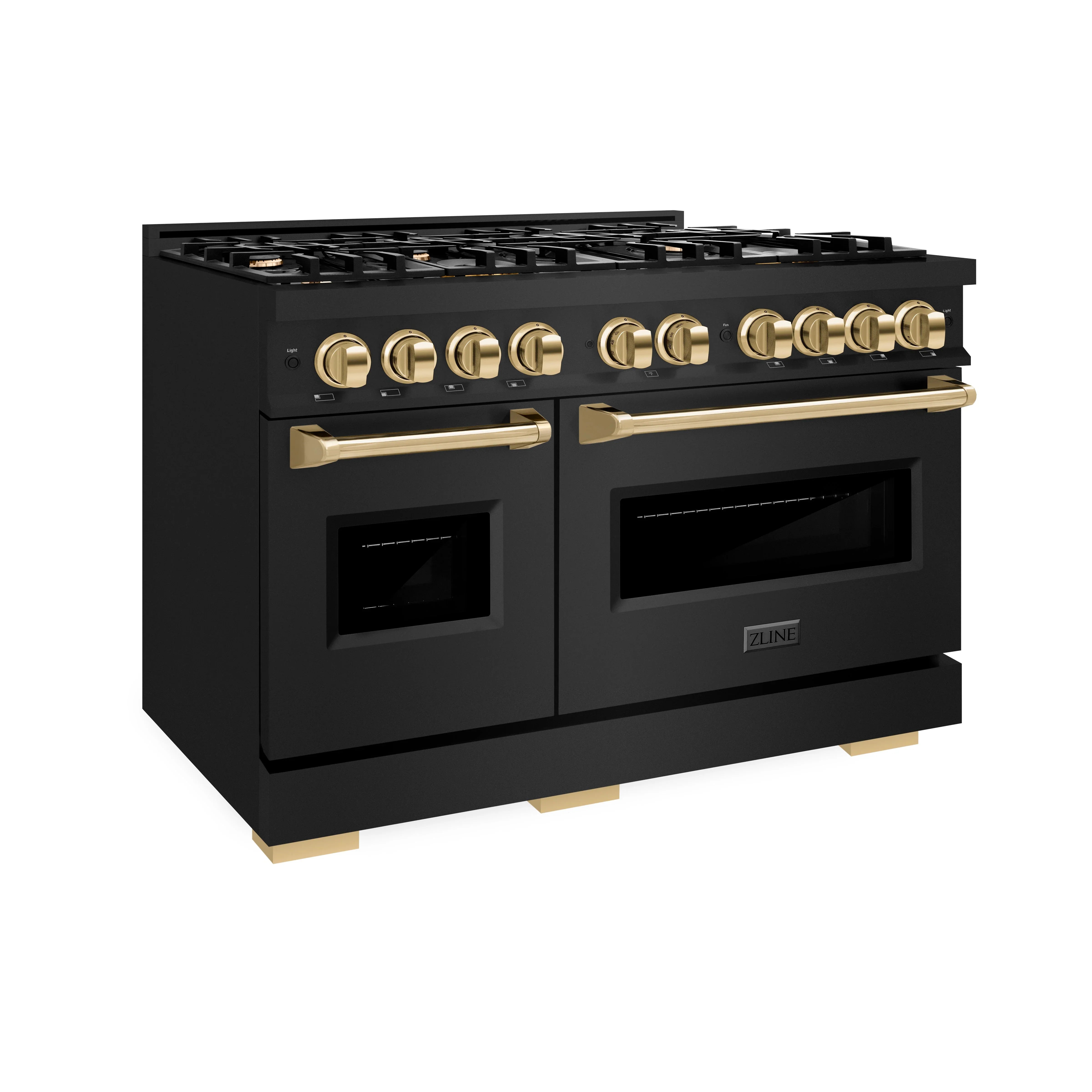Black dual fuel range with gold control knobs and dual oven doors