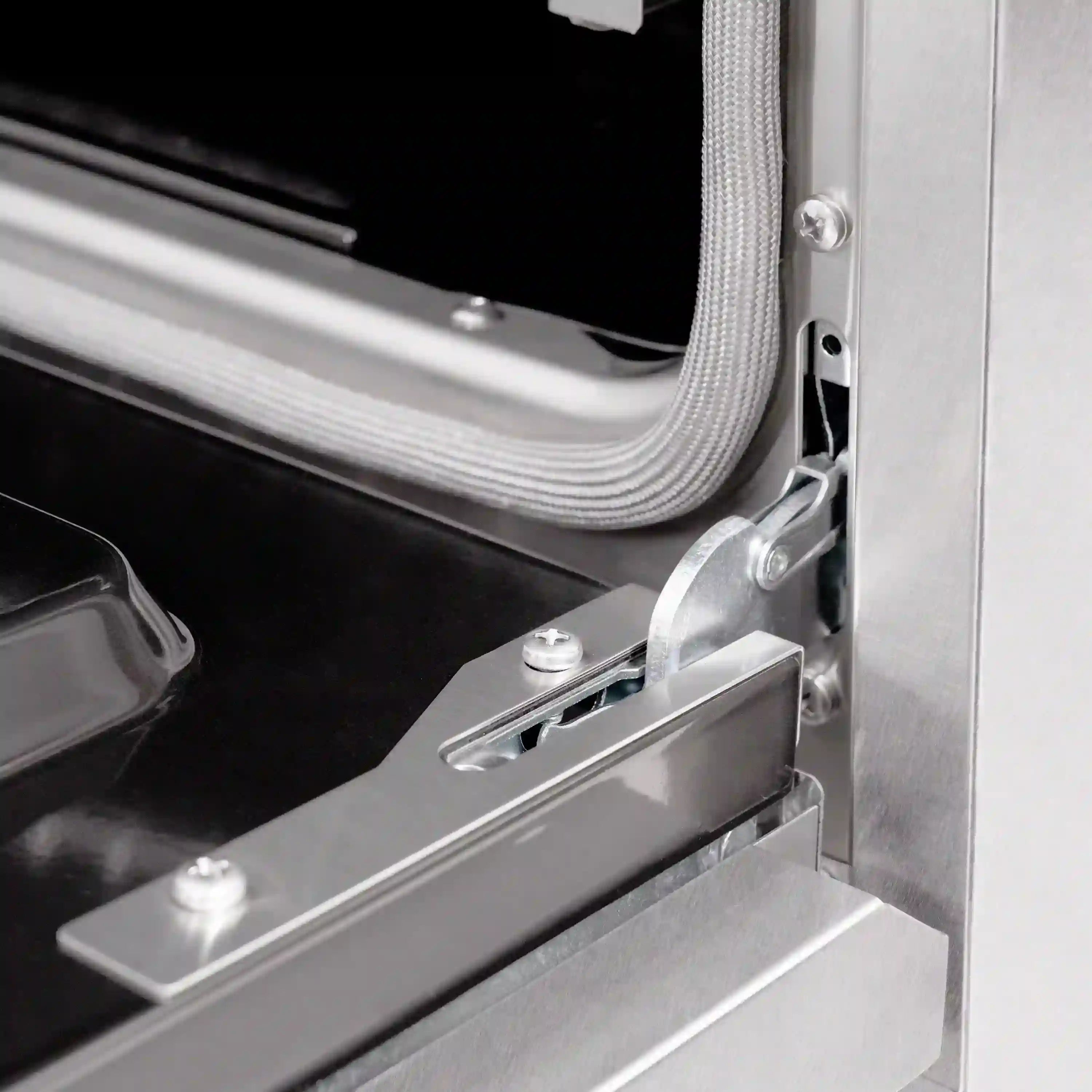 Stainless steel oven handle and mounting bracket with control panel edge