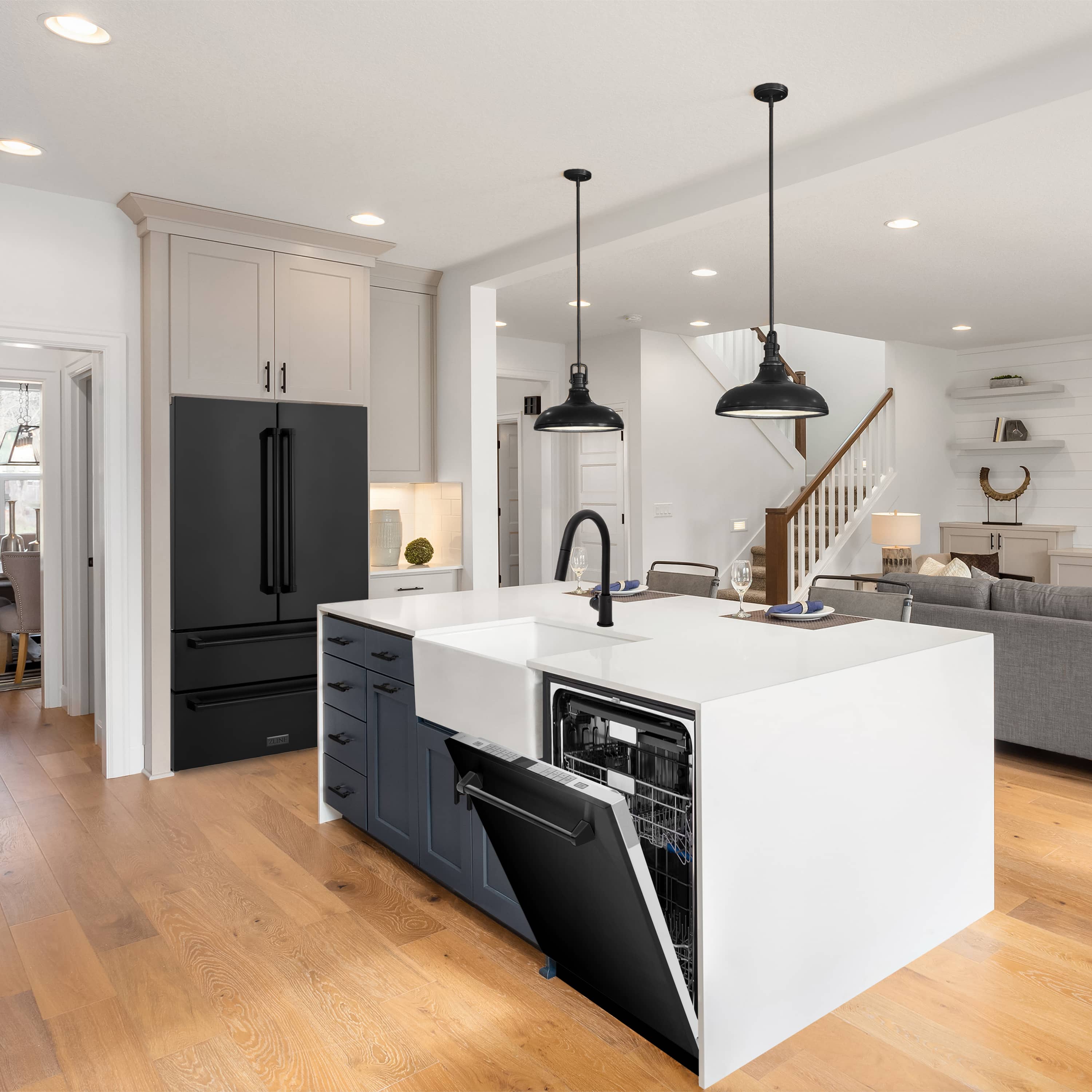 Black stainless refrigerator and dishwasher in a modern kitchen with white cabinetry
