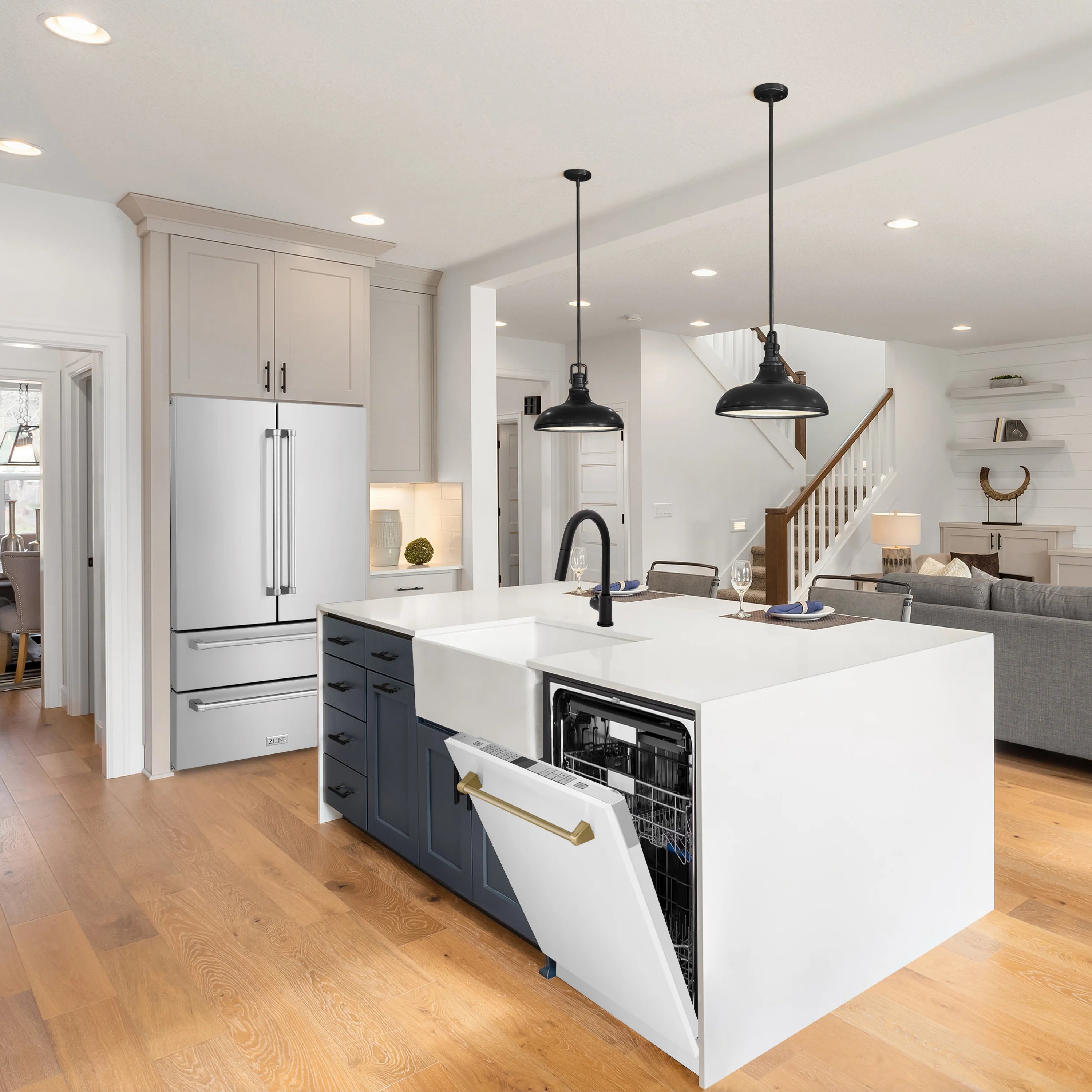 Built-in white dishwasher with champagne bronze bar handle, door open