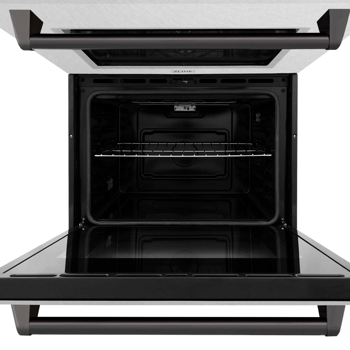 Double wall oven with door open, interior cavity and wire rack supports visible