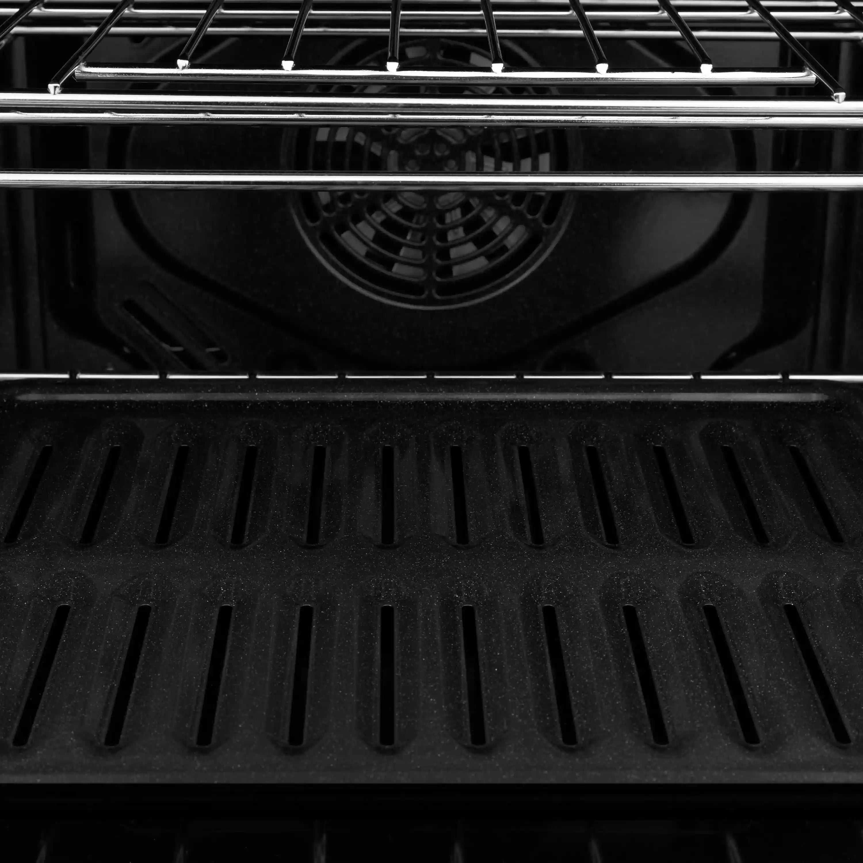 Single wall oven cooking cavity with ridged black oven liner and upper rack