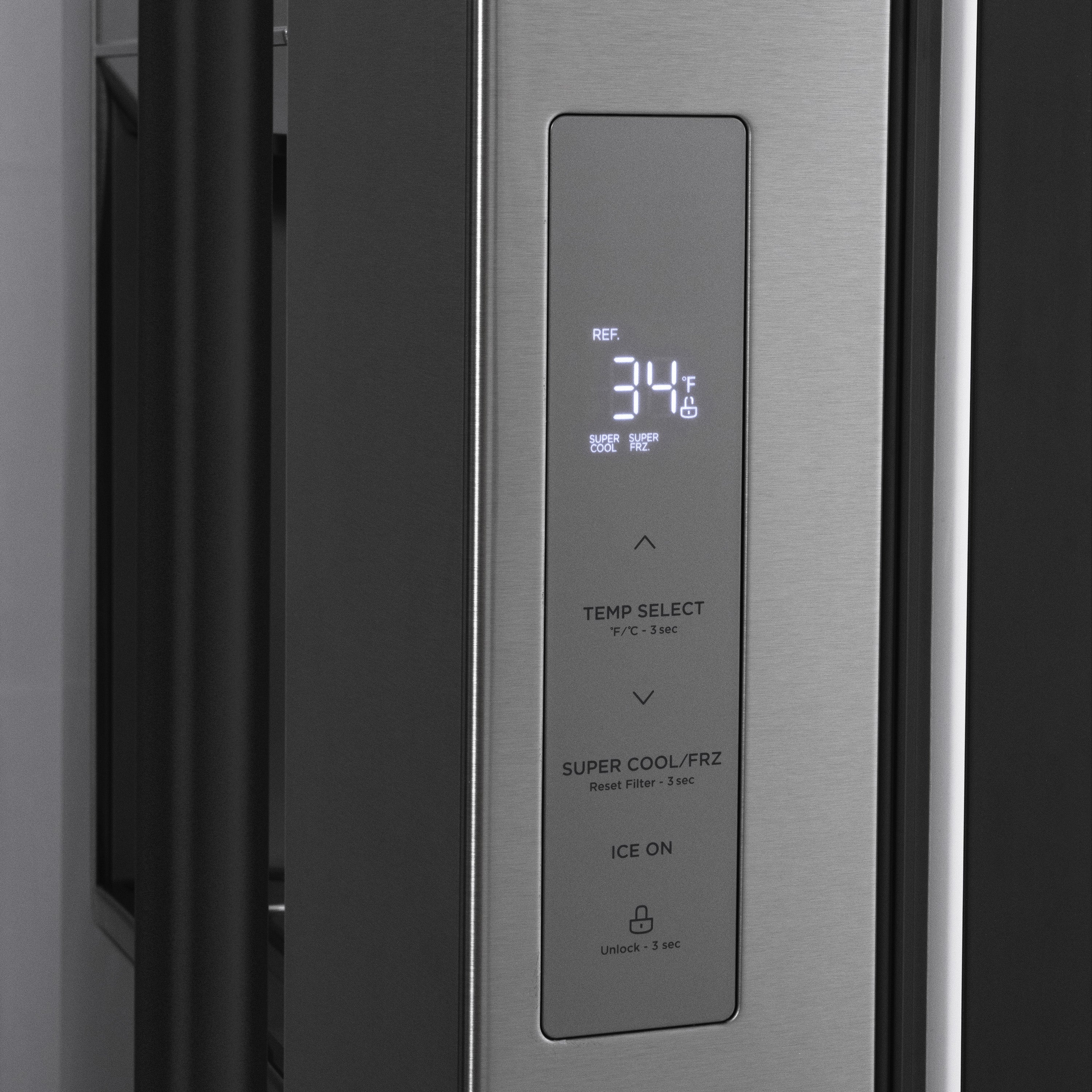 Stainless steel refrigerator water dispenser control panel with display and matte black trim