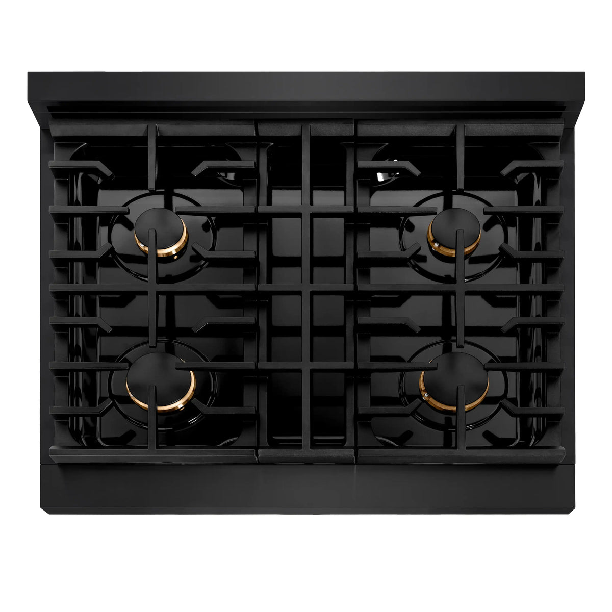 Black gas range cooktop with four burners and round gold-trimmed burner caps