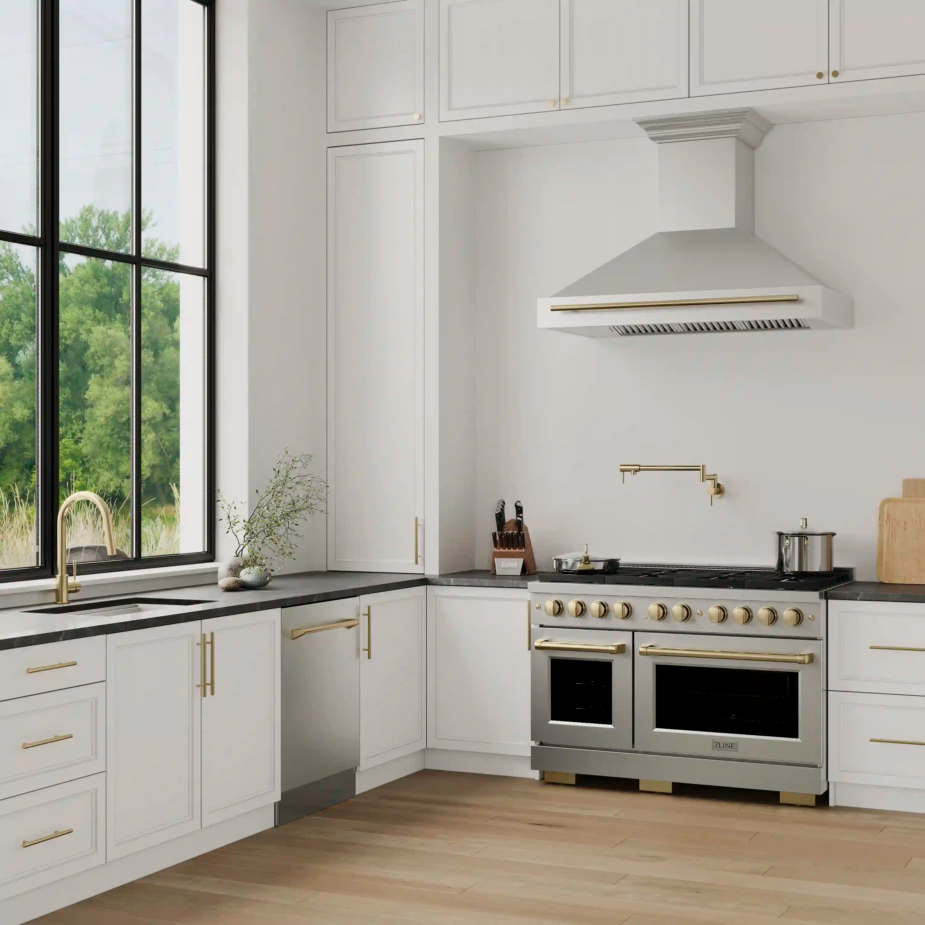 Stainless steel dual fuel range with 8-burner gas cooktop and double ovens, bronze accents