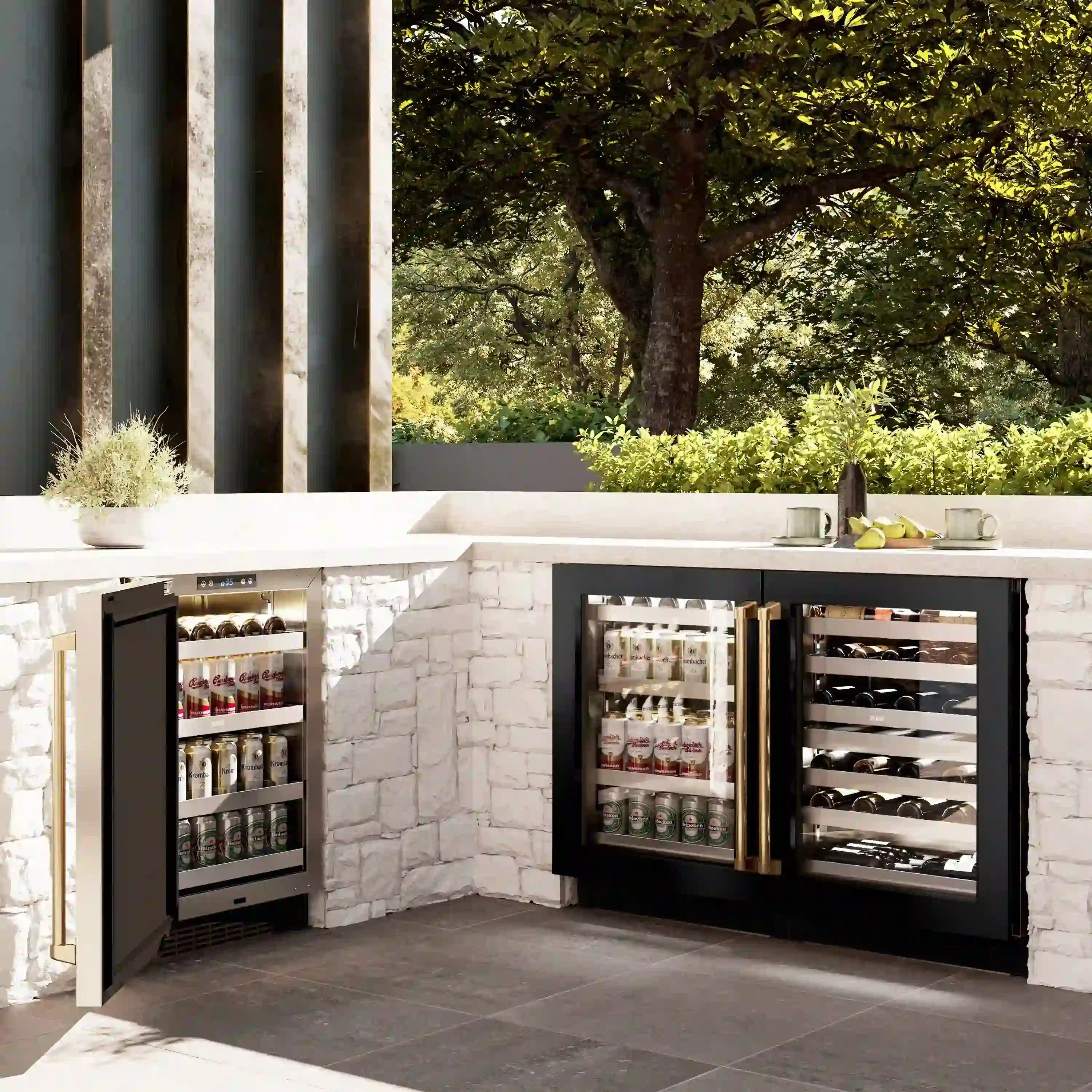 Built-in 24-inch beverage fridge with black cabinet and gold handle, glass doors with shelves.