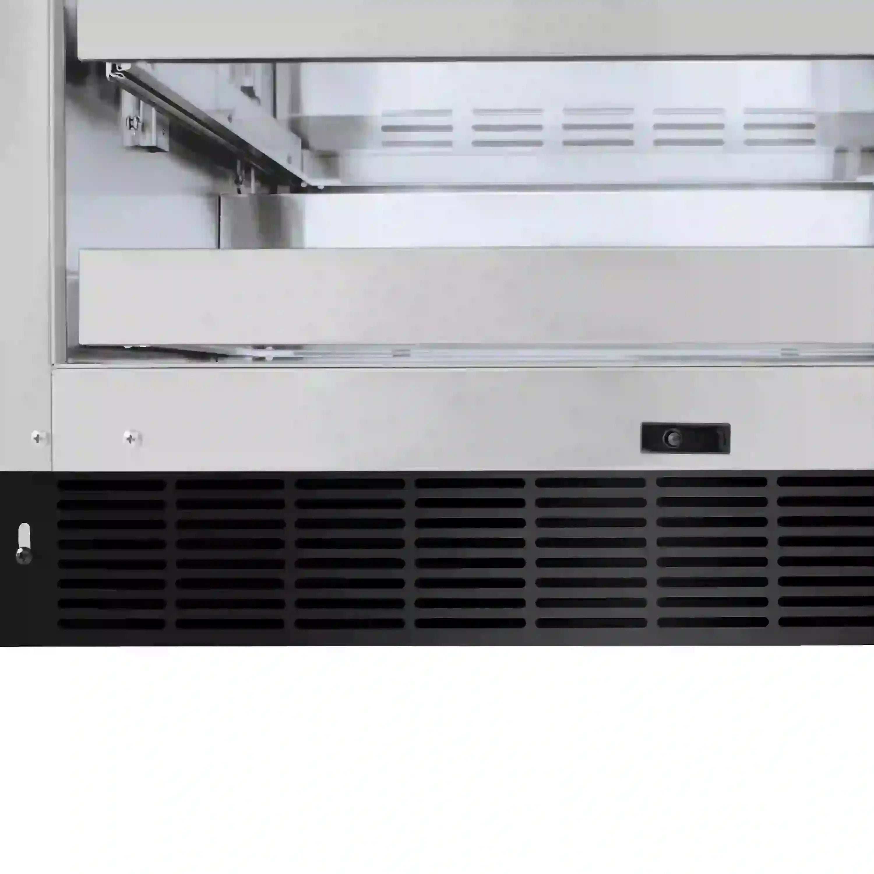 Beverage fridge front ventilation grille and control panel near bottom
