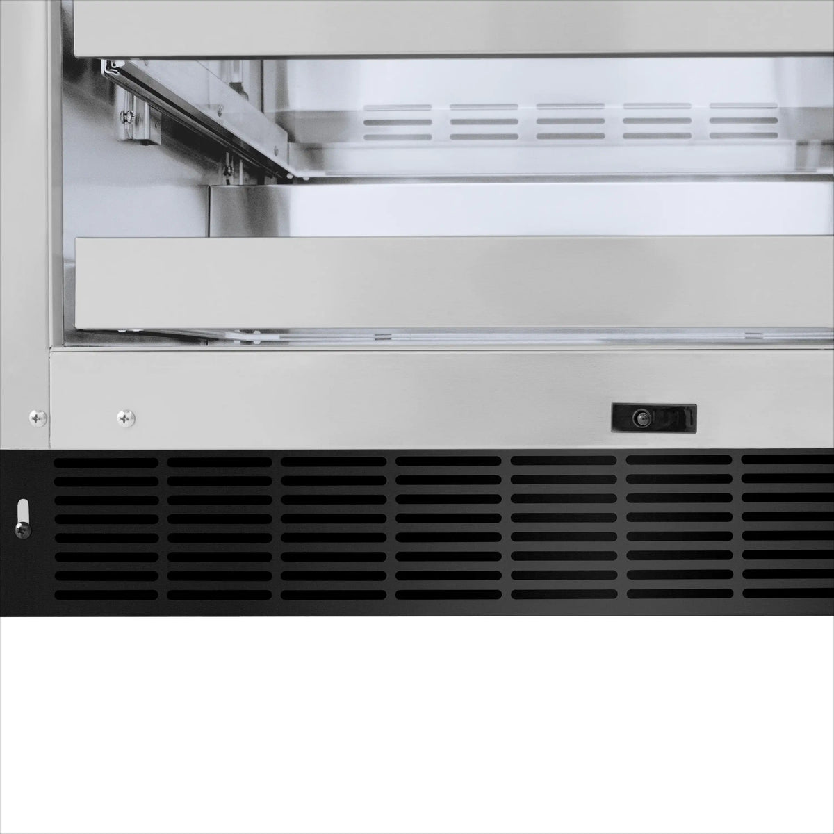Wine cooler front ventilation grille with small control switch near the bottom