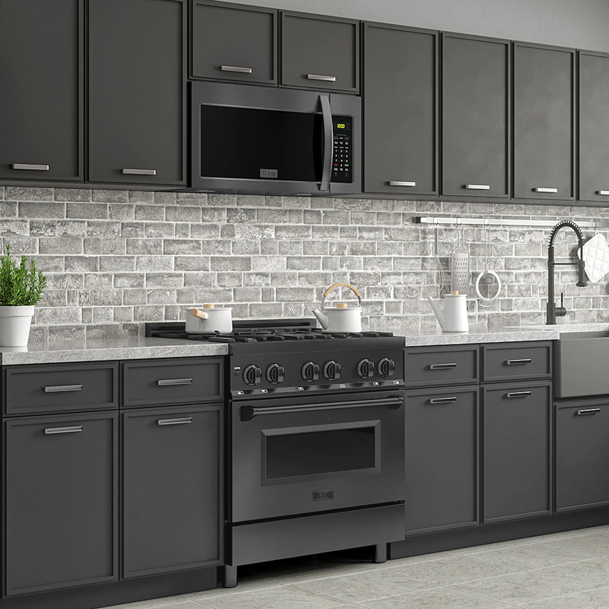 Over-the-range microwave and 30-inch range combo in black stainless steel with handles