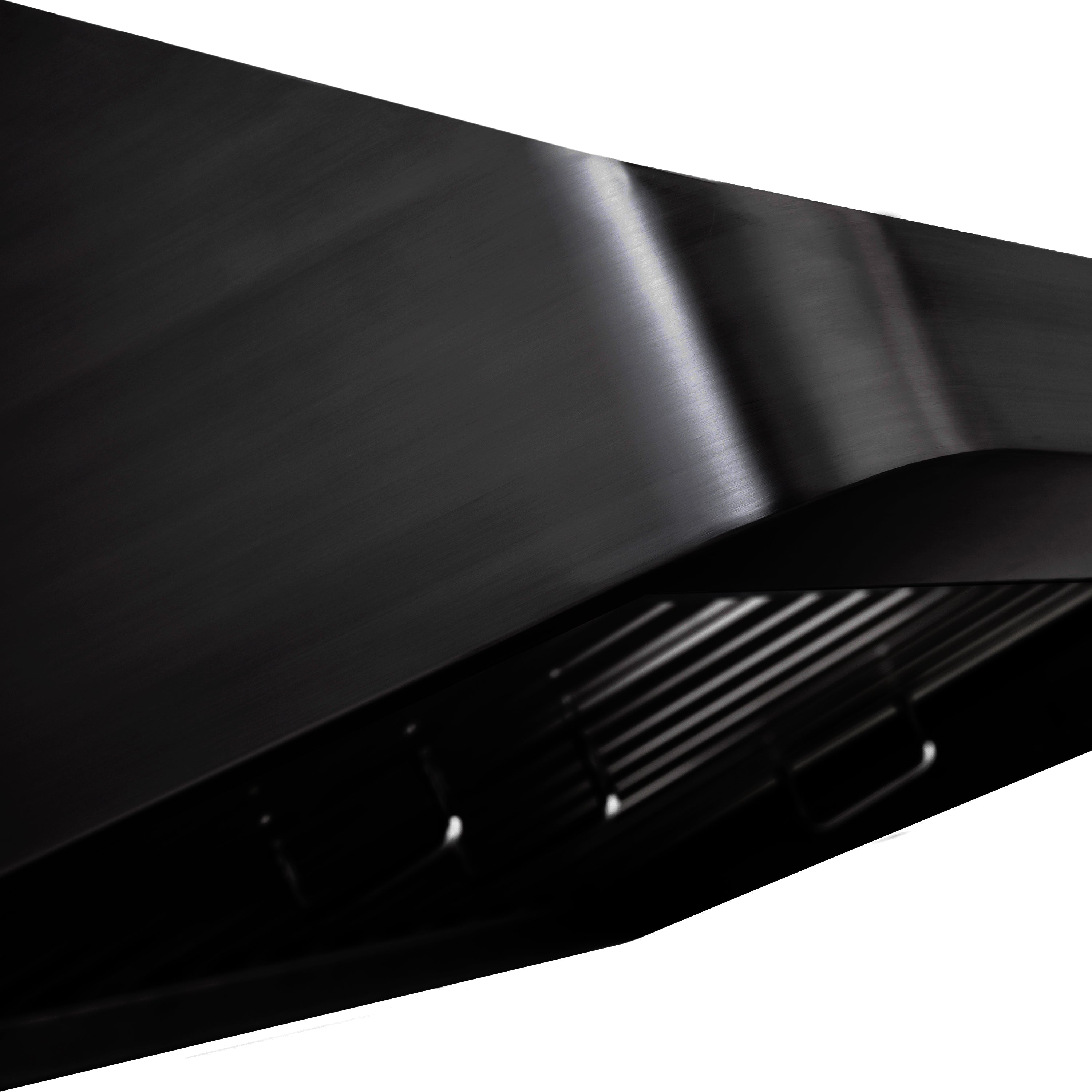 Black under-cabinet range hood canopy with vent grilles and side filters, close-up.