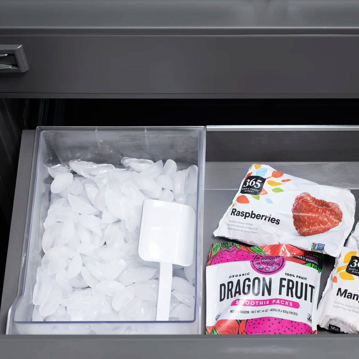 French door refrigerator freezer bin with frozen ice packs and food pouches