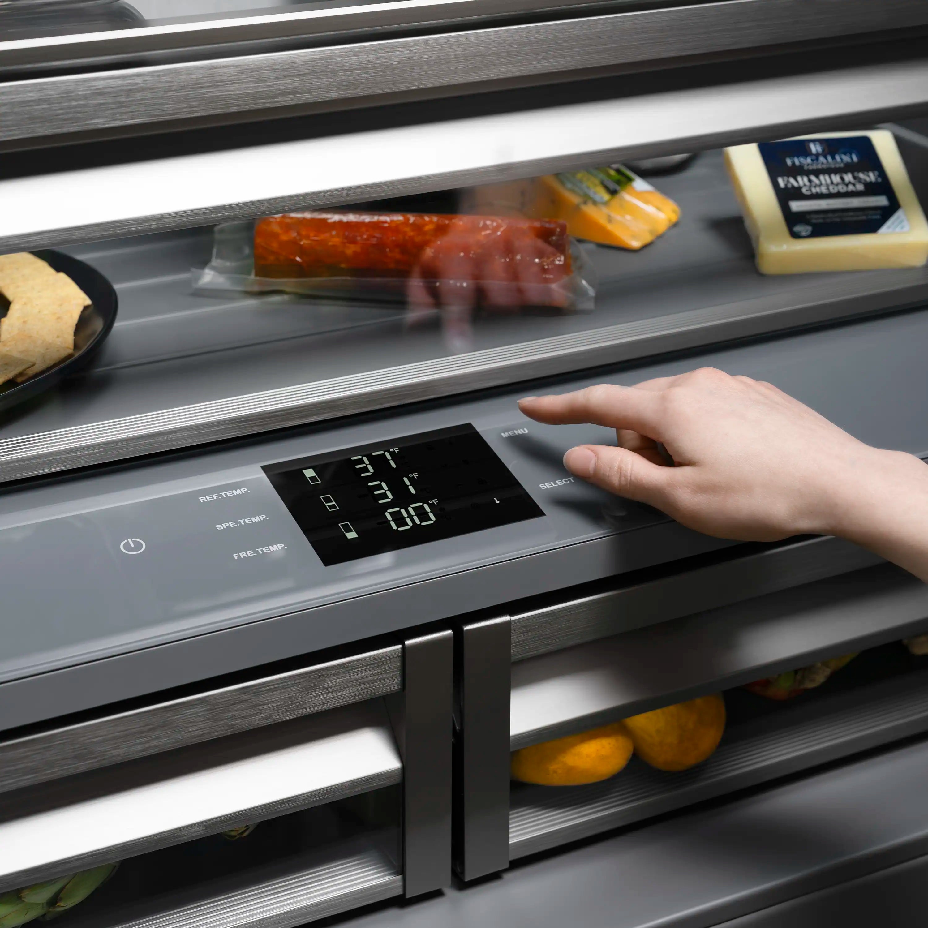 Black stainless steel French door refrigerator with built-in digital control panel and dark handles