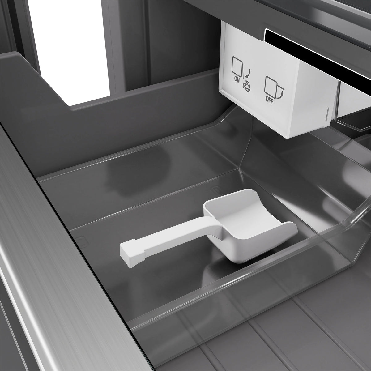 Graphite gray freezer interior with white ice bin and door control switches